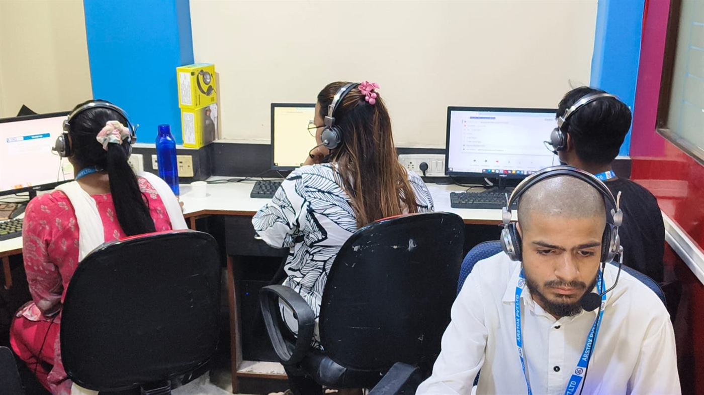 ARSTOX customer support executives at work